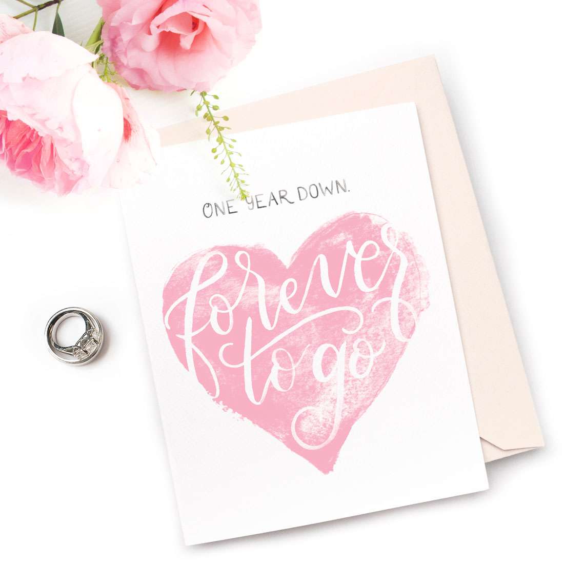 Image of a hand-lettered watercolor card saying "one year down. forever to go" with a watercolor heart by CharmCat | charmcat.net