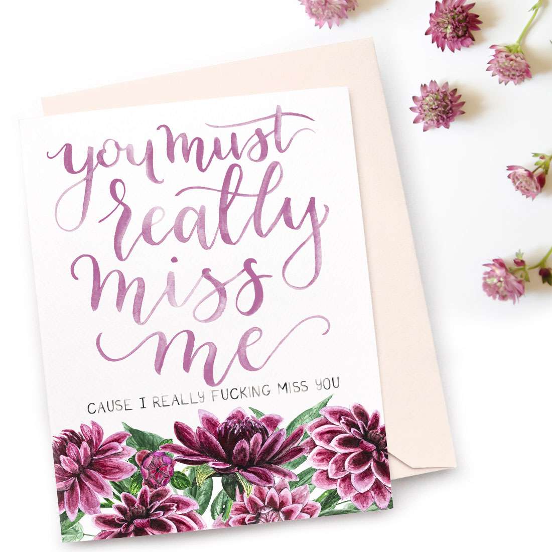 Image of a hand-lettered watercolor card saying "you must really miss me... cause I really fucking miss you" with purple dahlias by CharmCat | charmcat.net
