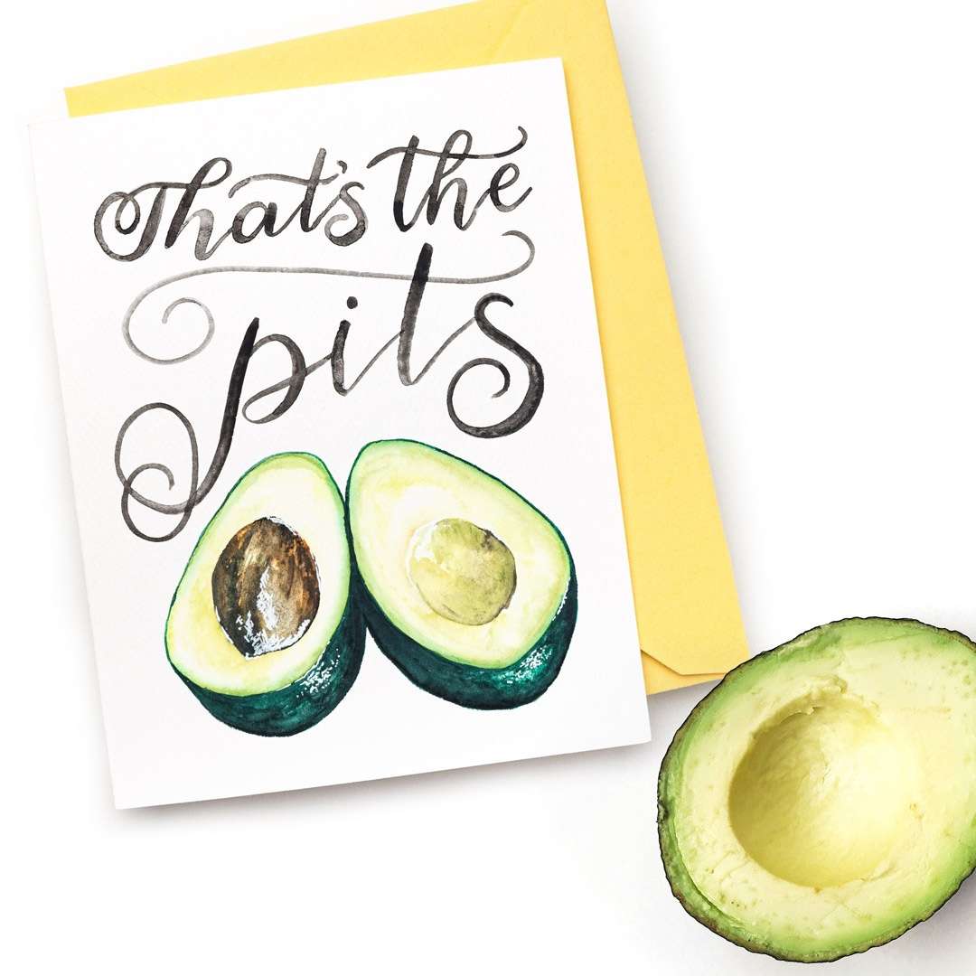 A funny sympathy card for someone who needs a pick-me-up and loves avocados. Sometimes things are just the pits! A hand-lettered watercolor card saying "That's the pits" with an avocado cut in half | Original greeting cards painted in watercolor by CharmCat | charmcat.net