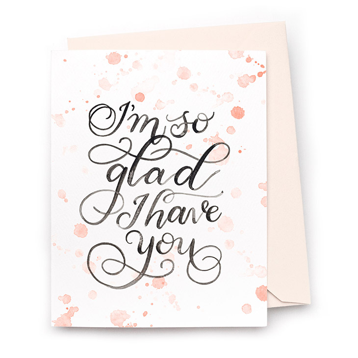 Image of a hand-lettered watercolor card saying "I'm so glad I have you!" by CharmCat | charmcat.net