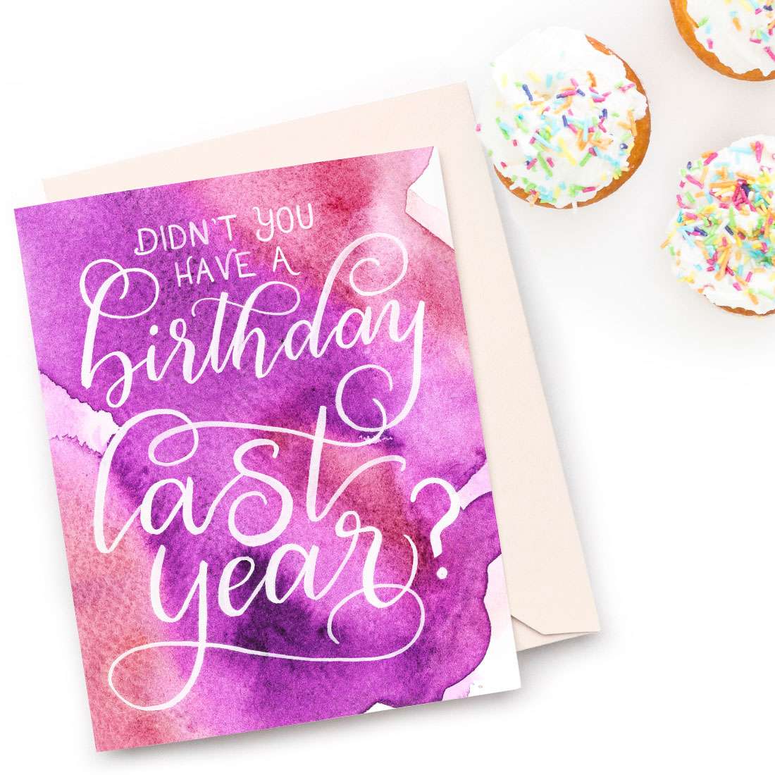 Image of a hand-lettered watercolor card saying "Didn't you have a birthday last year?" by CharmCat | charmcat.net