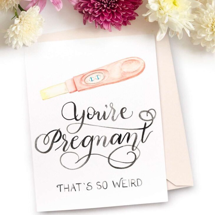 Image of a hand-lettered watercolor card saying "You're Pregnant... that's so weird" with a positive home pregnancy test by CharmCat | charmcat.net