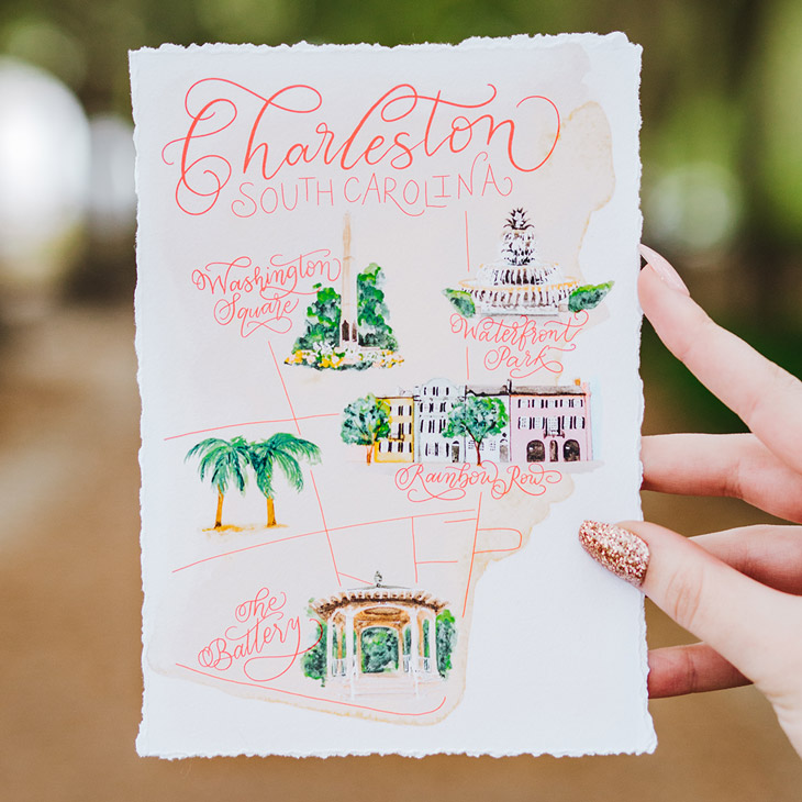 Custom watercolor map of Charleston SC showing different locations with calligraphy and printed on deckled paper | Art by CharmCat | Photo by Allie Dearie Photography