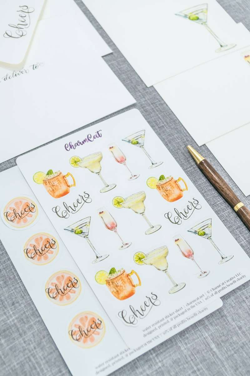 A sticker sheet with four different cocktail stickers.