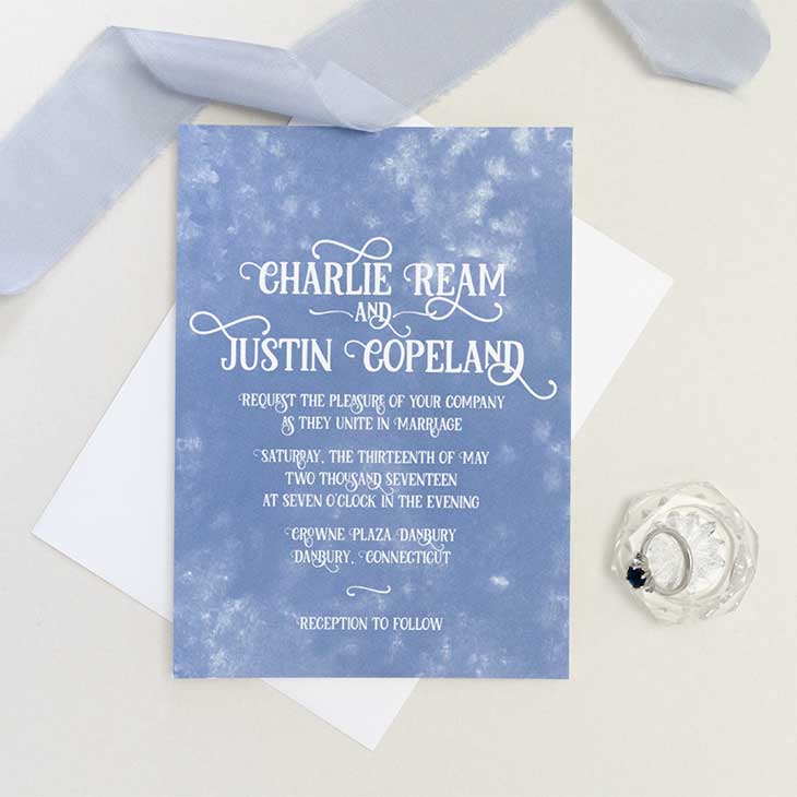 A wedding invitation suite with a soft watercolor background. | Wedding Invitations by CharmCat Stationery & Design