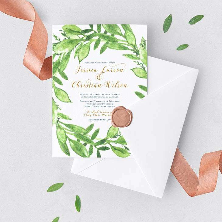 This invitation design features watercolor leaves painted with a soft, loose technique that radiate light, growth, and life. Shown in bright greens paired with classic typography in gold and navy.