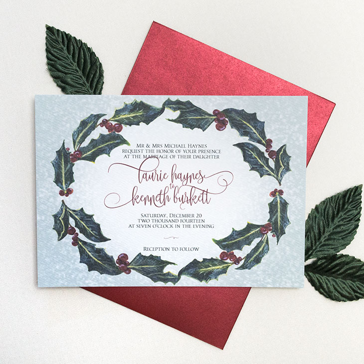 A classy winter wedding invitation suite with a holly wreath. | Wedding Invitations by CharmCat Stationery & Design