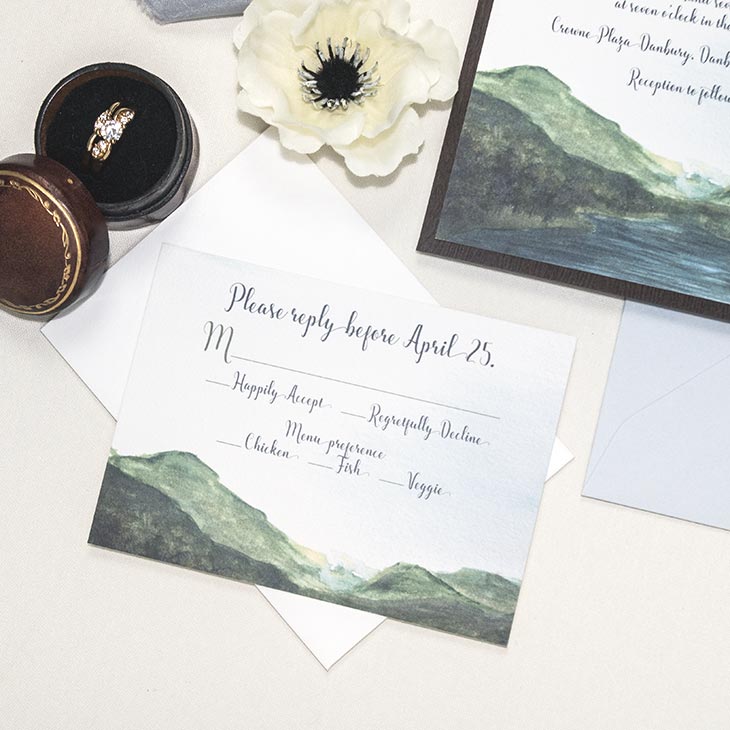 This hand painted landscape design shows off the beauty and vastness of nature, featuring a lush mountain range and tranquil lake scene. Completely customizable with colors, fonts, and papers. | Wedding Invitations by CharmCat | charmcat.net | CharmCat is a watercolor artist specializing in creating uniquely artistic stationery for weddings, birthdays, parties, offices, and everyday.