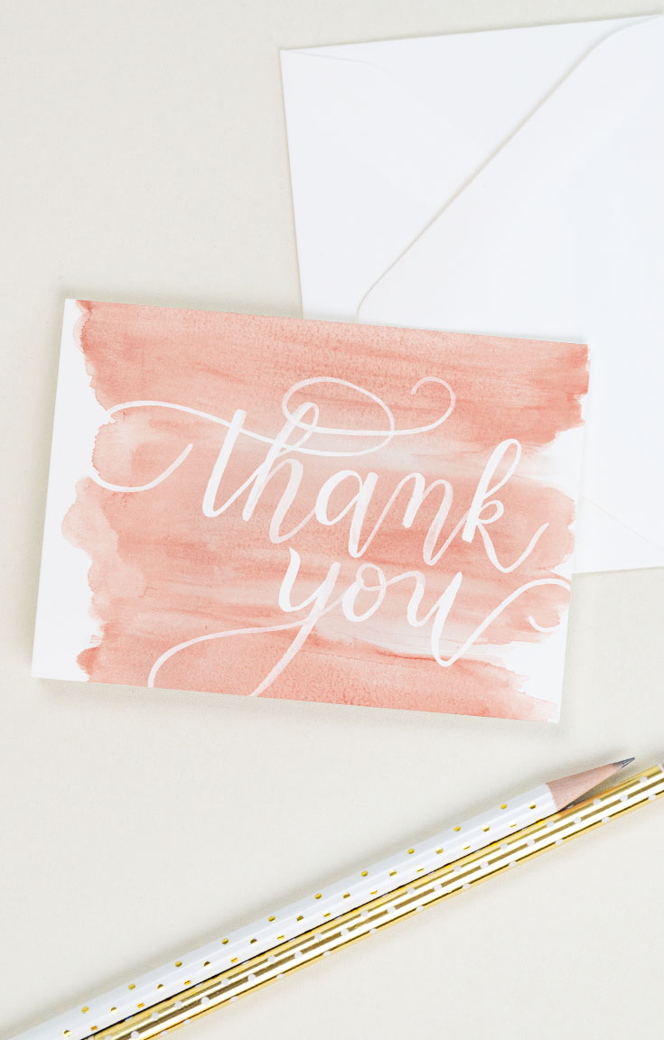 Thank you card covered in coral pink brush strokes and thank you painted in white. | CharmCat Creative charmcat.net