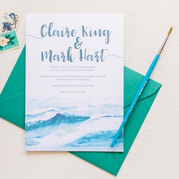 This design shows off the beauty of the ocean waves. You can almost hear the sounds of the tide going in and out! | Wedding Invitations by CharmCat | Photo by Heather Chipps